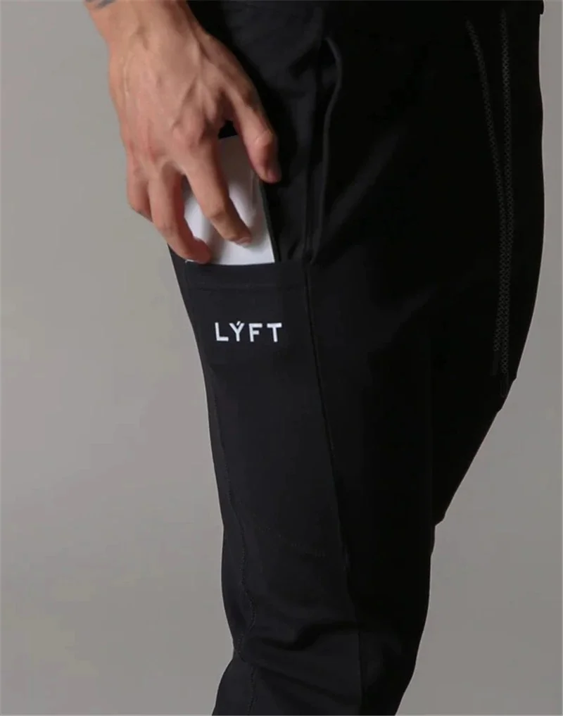 

2021 New Spring Pants Men Pantalon Homme Streetwear Jogger Fitness Bodybuilding Pants Pantalones Hombre Sweatpants Trousers Men