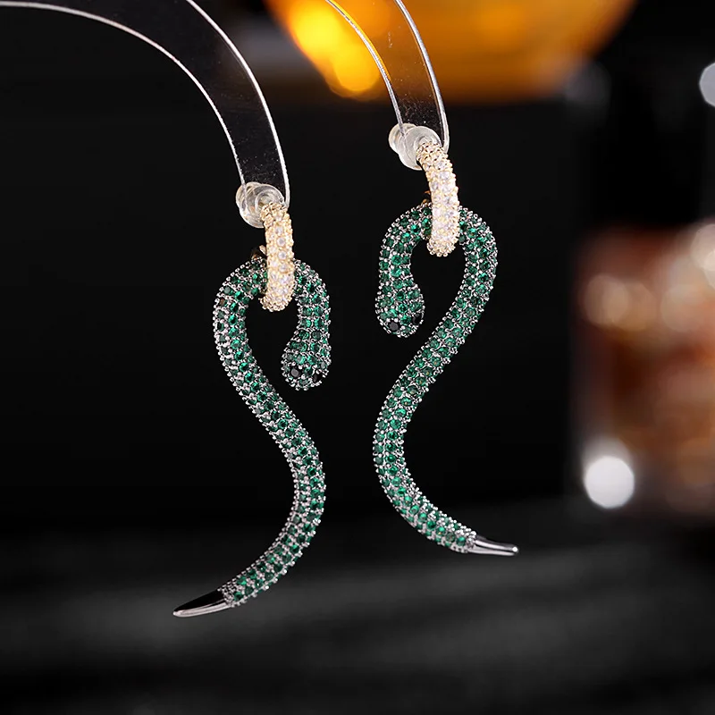 

Европейские и американские новые стильные высококачественные серебряные женские серьги в форме змеи с цирконом съемные две серьги