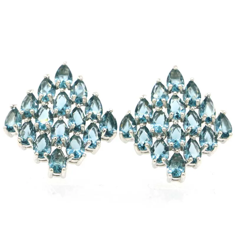 Серьги-гвоздики серебряные с голубым топазом и зеленым аметистом 28 х25 мм |