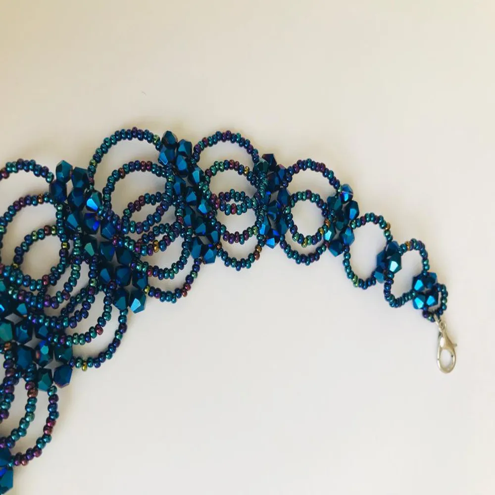 

Handmade with Sand Beads and Moon Shaped Crystal Pieces by Housewives, Trendy Design Wonder Necklace Suitable for Evening Wear