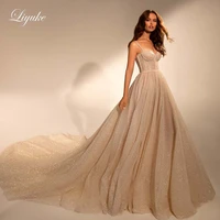liyuke sparkle lace of chamapgne a line wedding dresses with spaghetti strap sewed beads sweetheart neckline