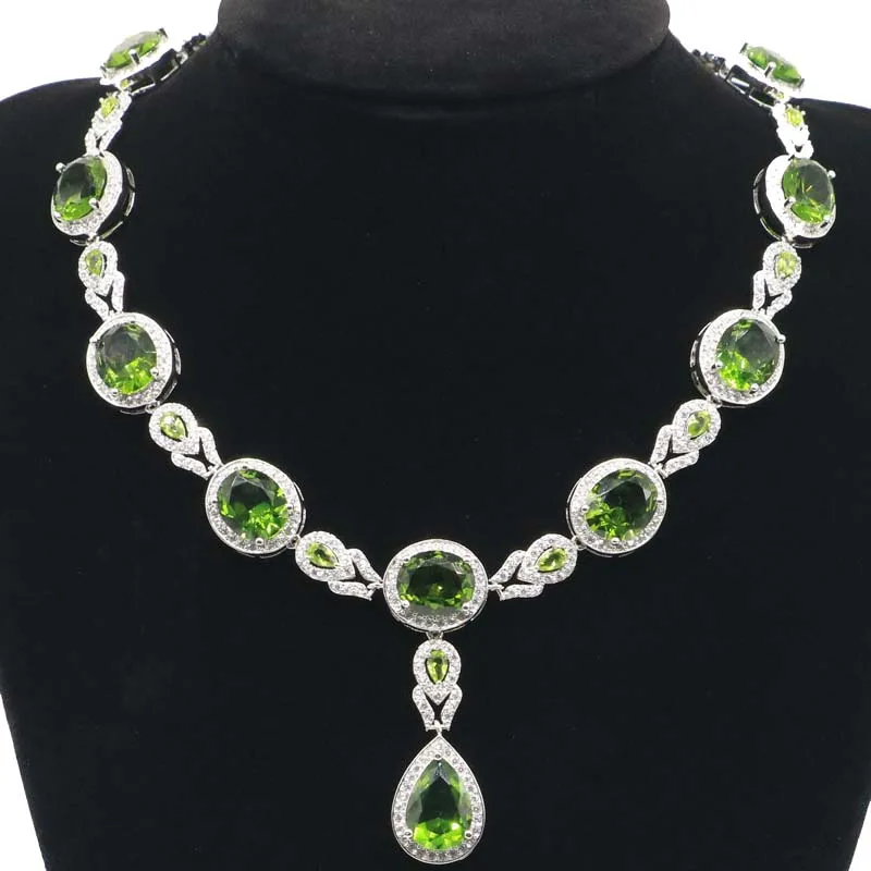 

Потрясающее Свадебное женское серебряное ожерелье с зеленым Перидотом, лондонским голубым топазом и белым кубическим цирконием, 48x16 мм, 50 г,...