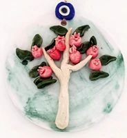 handmade evil eye beaded wall ornament with marble patterned ceramic pomegranate tree