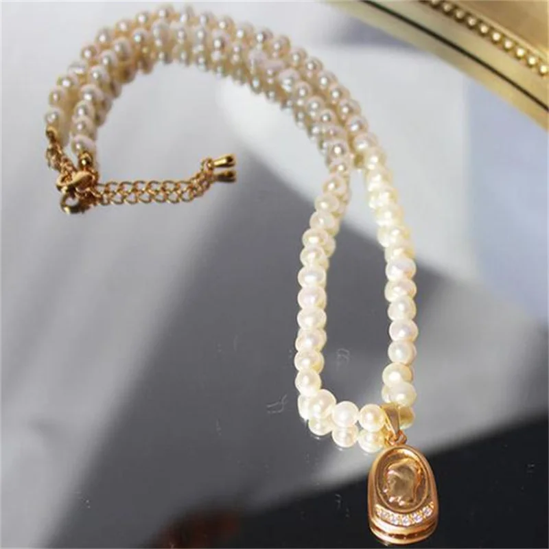 

European And American Fashion Retro Female Head Freshwater Pearl Micro-Inlaid Zircon Temperament Clavicle Chain