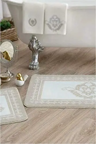 

TA Printed 2 Pcs Mat Set Artemis Ecru 71211651 Product Features Mop: 60X100 (1 Piece) Decorative Mop: 50X60 (1 Piece) 100% Poly