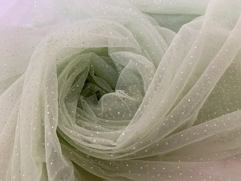 

Light Green Soft Mesh Lace Fabric With Glitters, Galaxy Look Well Drape Tulle Lace Fabric