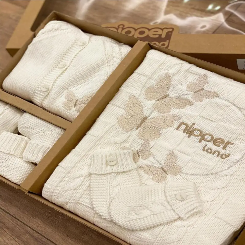 

Nipperland Knitted Italian brand newborn set