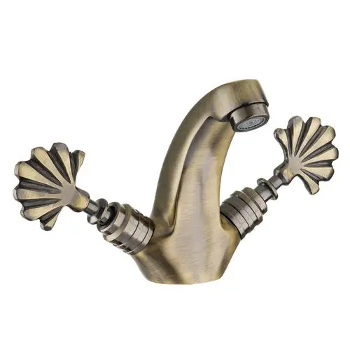 

Antique coated sink mounted faucet with a Turkish bath look has double water inlets. Hammam ambiance product, From Turkey