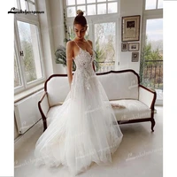 charming tulle a line wedding dresses sexy low v neck spaghetti straps sleeveless court train bride gowns appliques beading lace